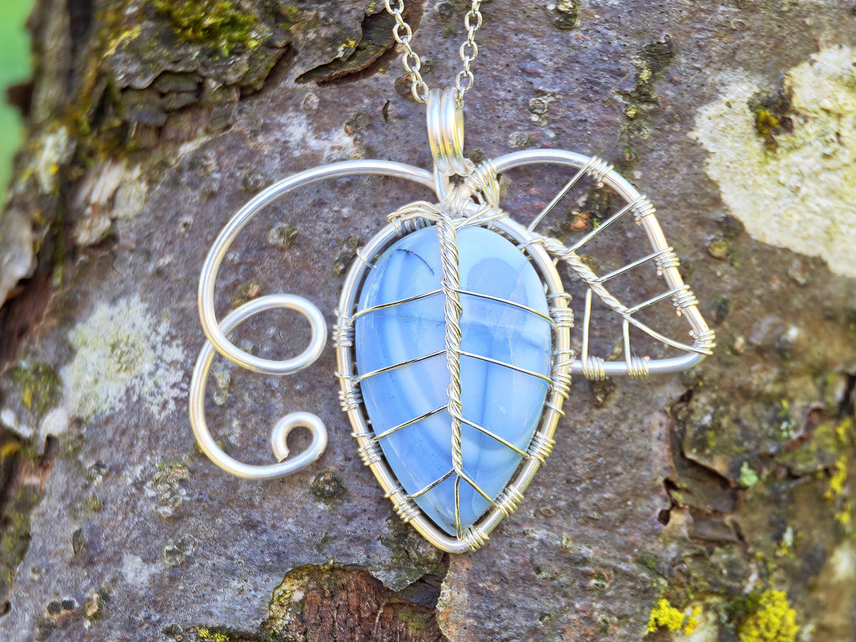 Leaf pendant with a blue opal gemstone