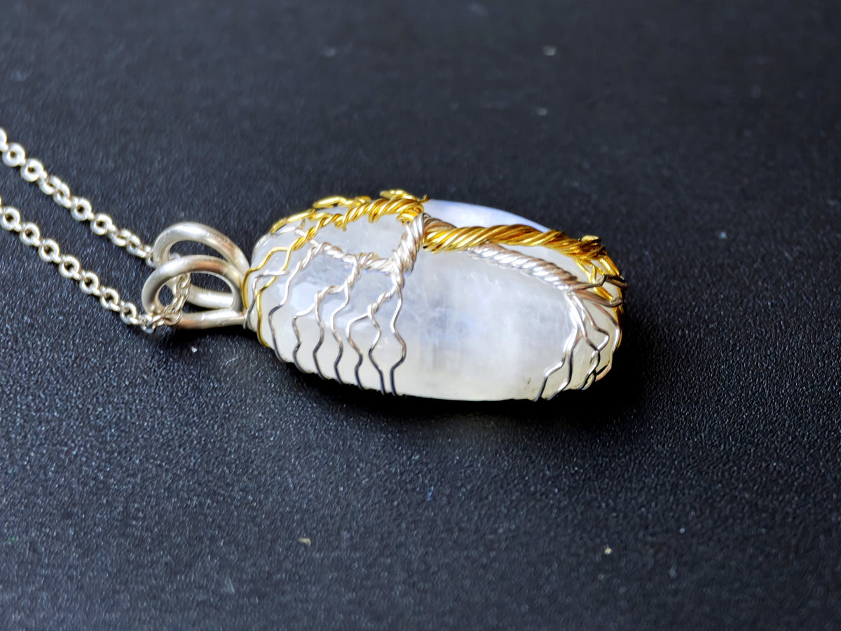 Fantasy inspired pendant with a moonstone: The Two Trees