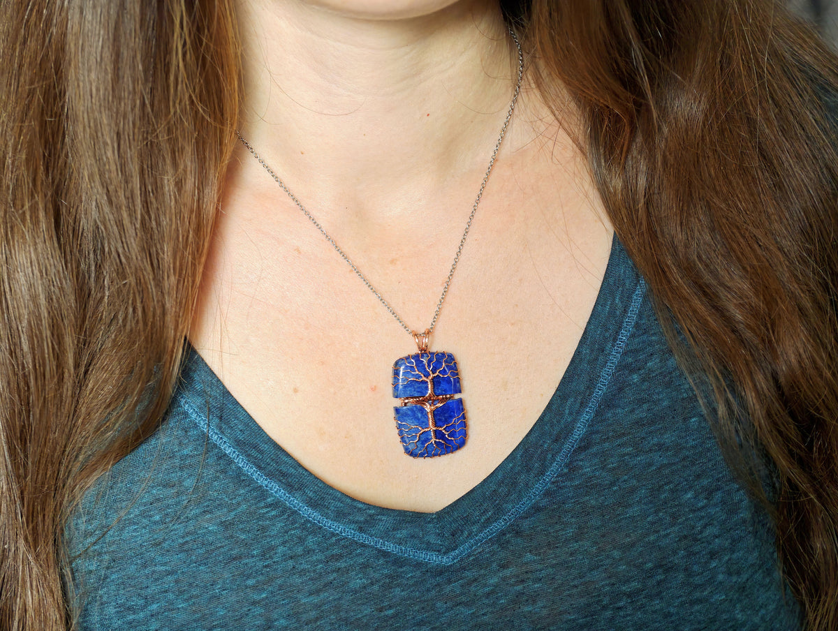 Tree pendant with a broken lapis lazuli gemstone