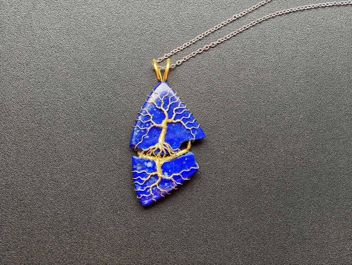 Tree pendant with a broken lapis lazuli gemstone