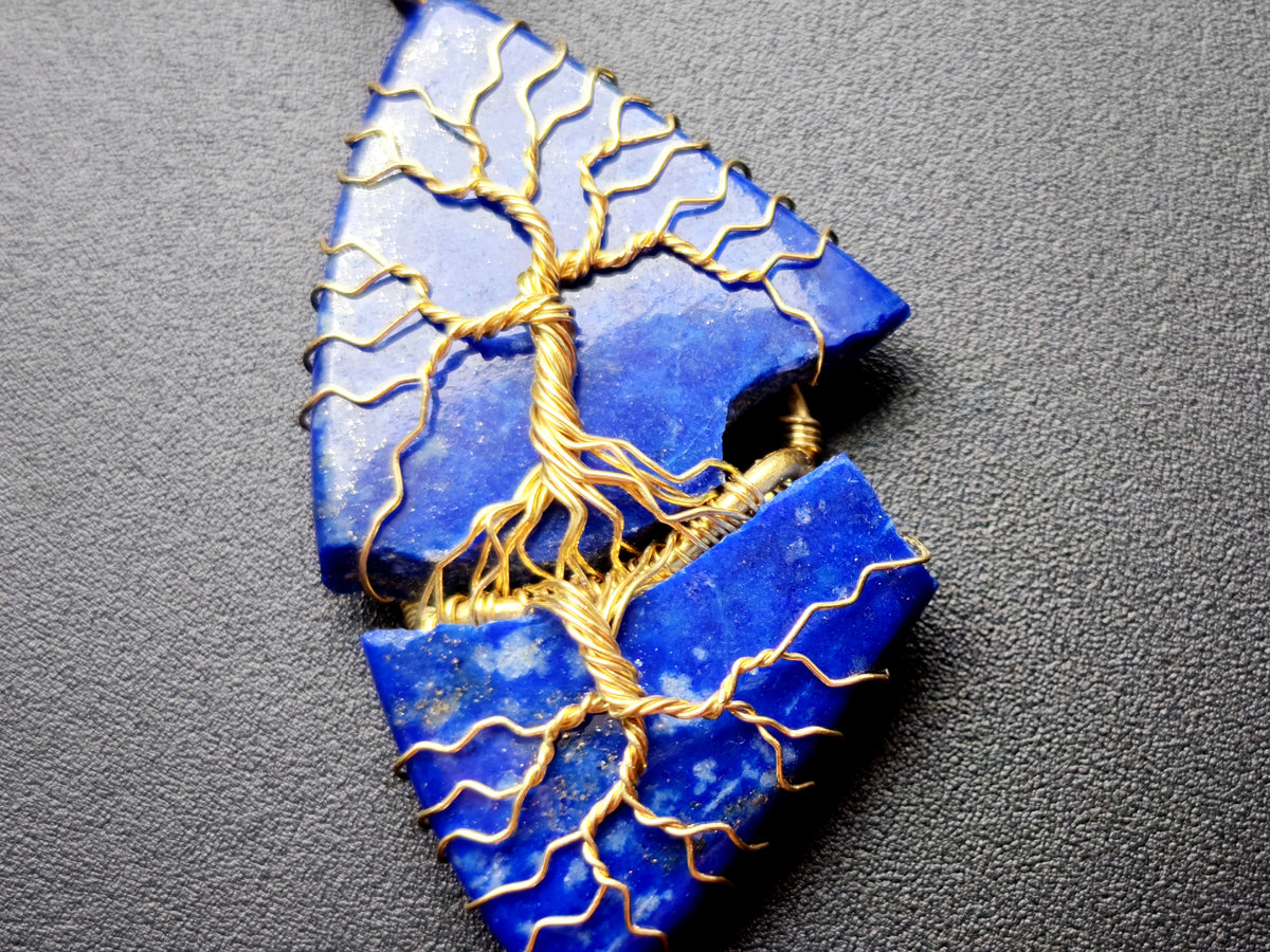 Tree pendant with a broken lapis lazuli gemstone