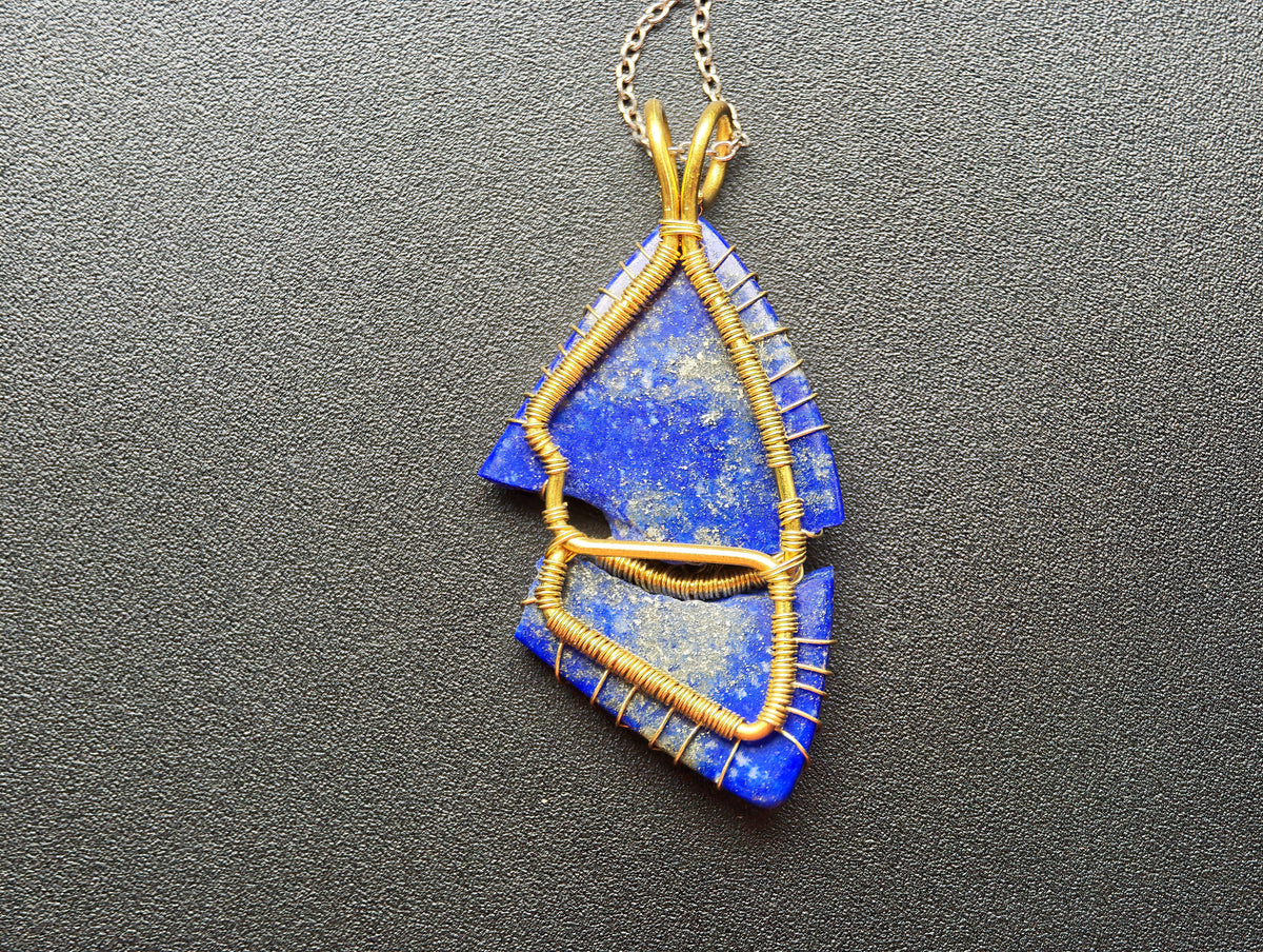 Tree pendant with a broken lapis lazuli gemstone