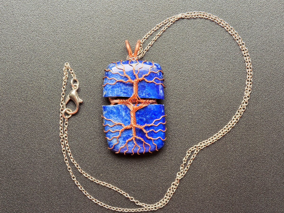 Tree pendant with a broken lapis lazuli gemstone