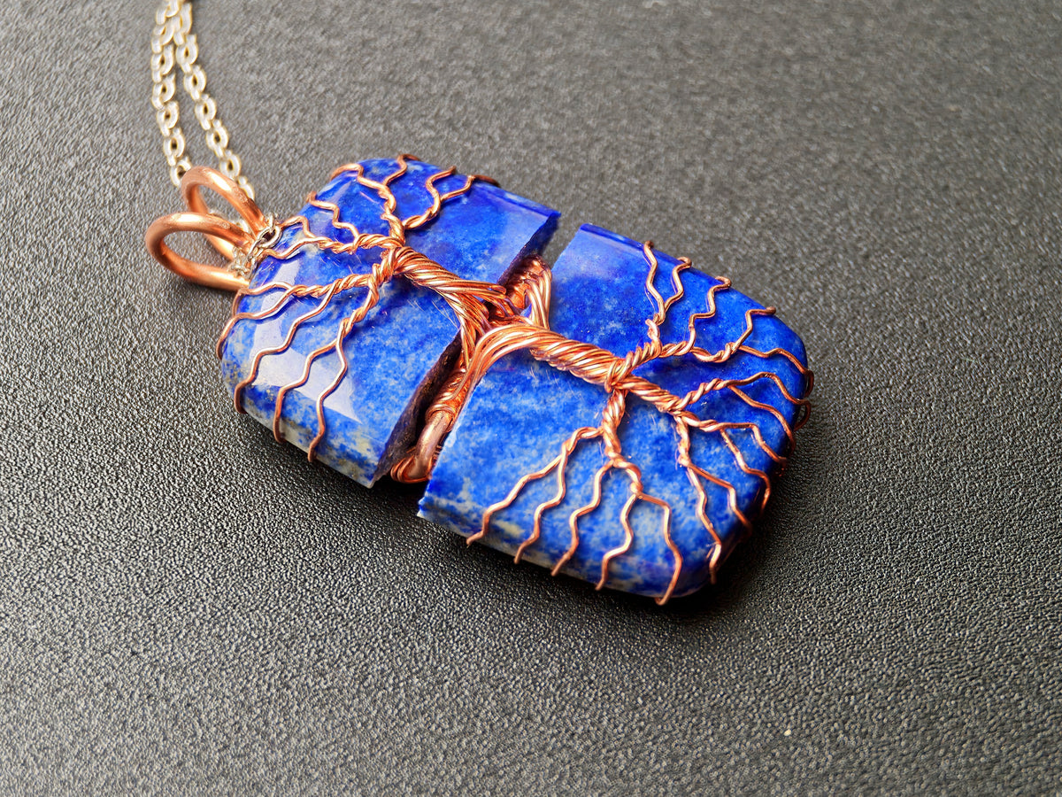 Tree pendant with a broken lapis lazuli gemstone