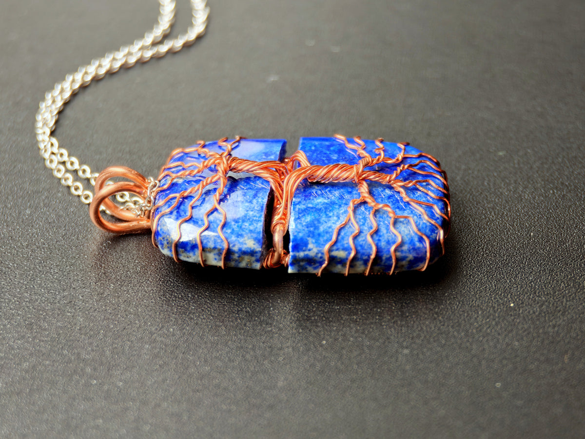 Tree pendant with a broken lapis lazuli gemstone