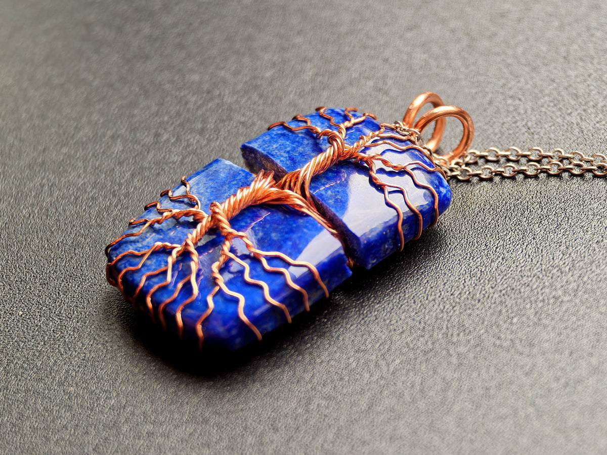 Tree pendant with a broken lapis lazuli gemstone