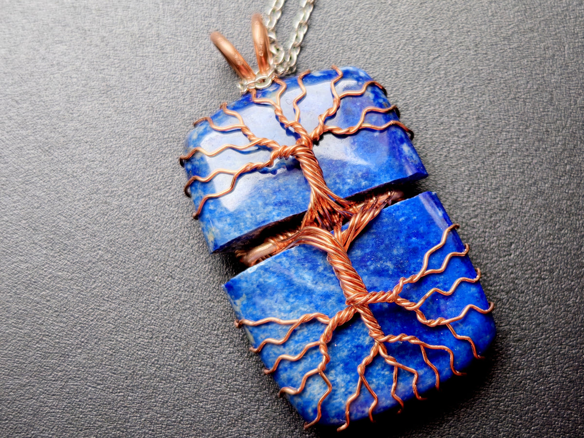 Tree pendant with a broken lapis lazuli gemstone