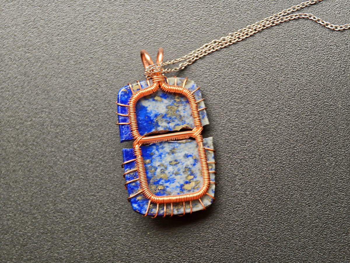 Tree pendant with a broken lapis lazuli gemstone