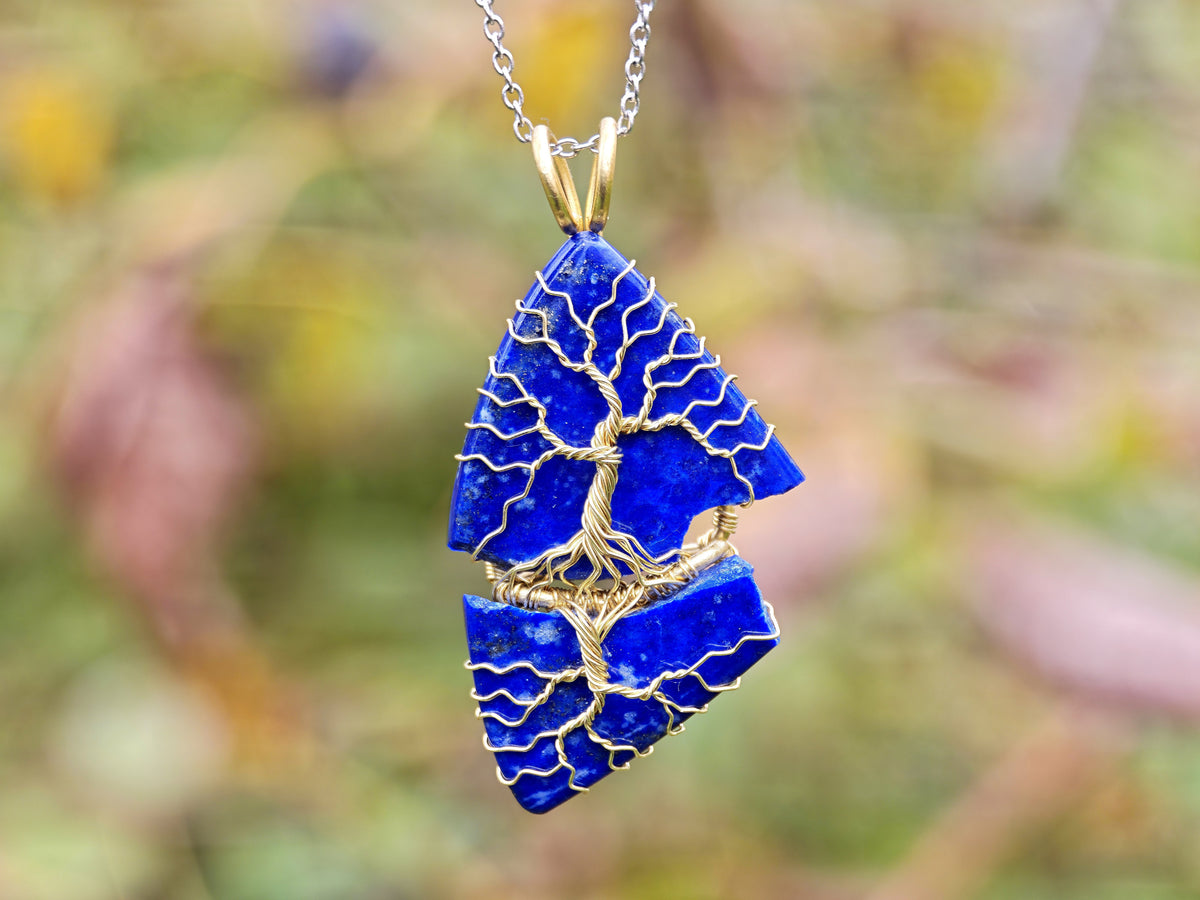 Tree pendant with a broken lapis lazuli gemstone