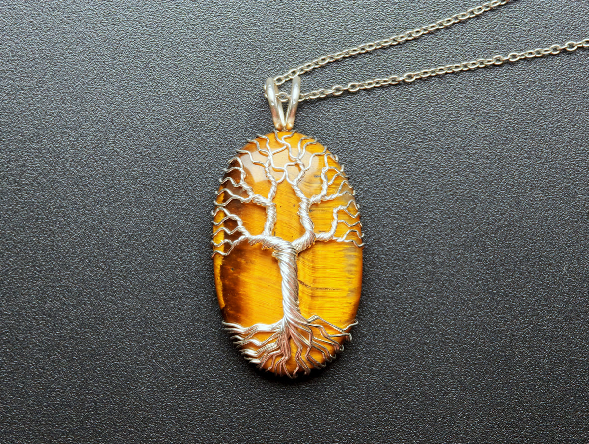 Tree pendant with a tiger's eye gemstone