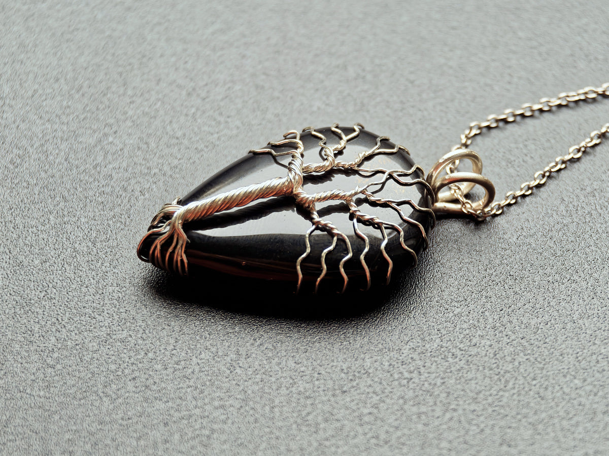Tree pendant with a black onyx gemstone