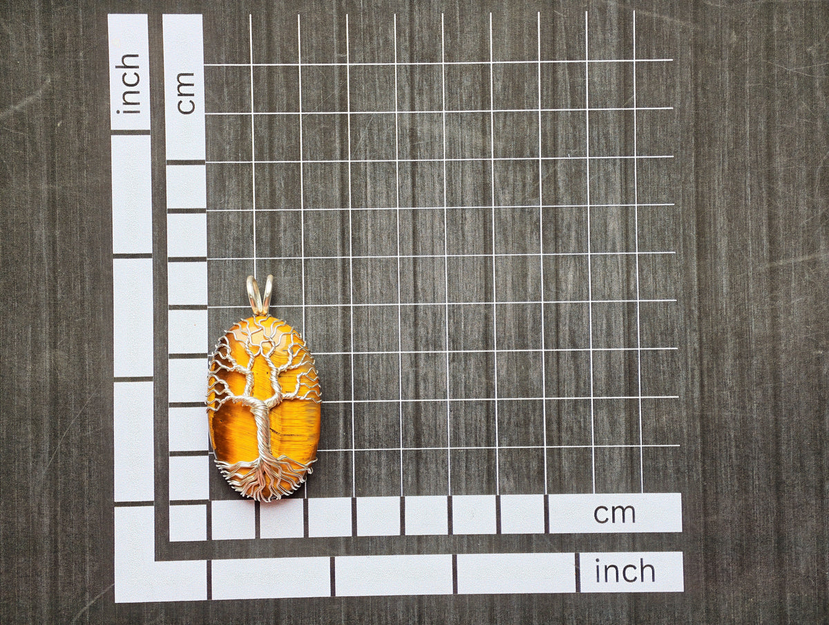 Tree pendant with a tiger's eye gemstone