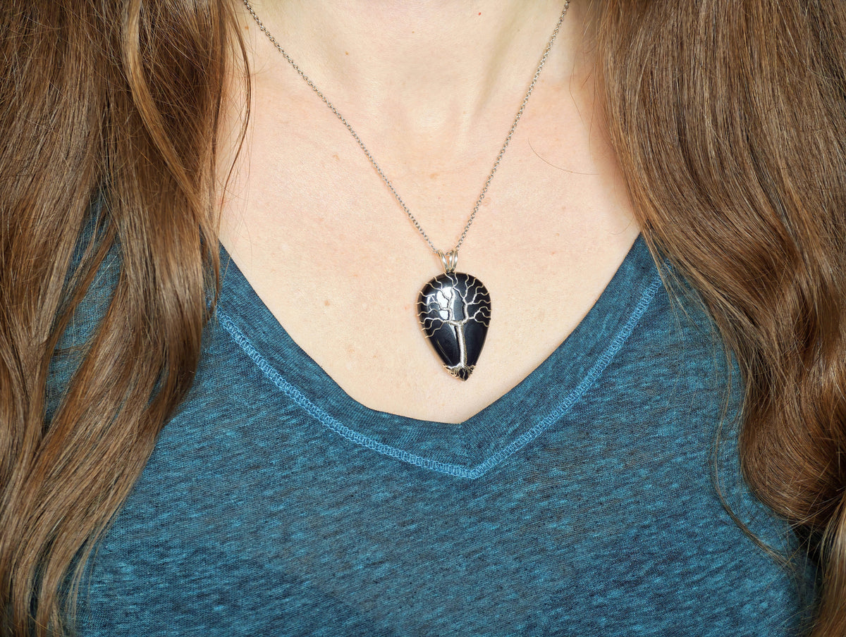 Tree pendant with a black onyx gemstone