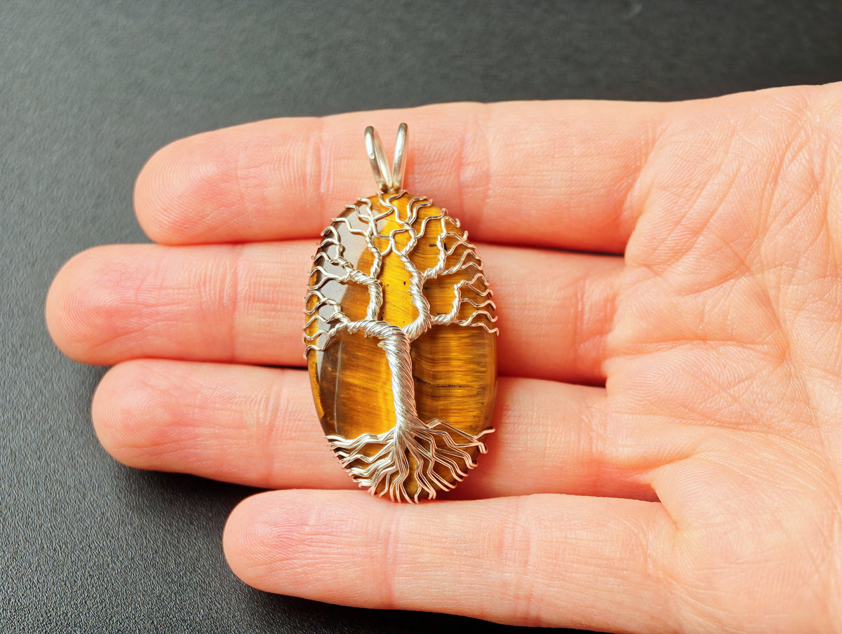 Tree pendant with a tiger's eye gemstone