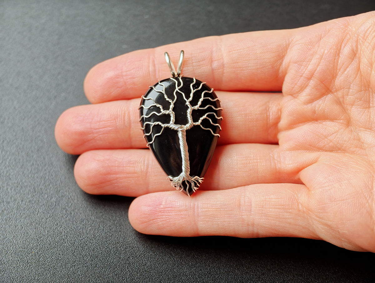 Tree pendant with a black onyx gemstone