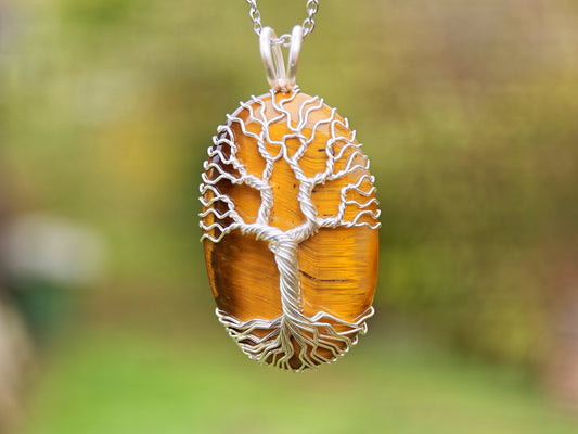 Tree pendant with a tiger's eye gemstone