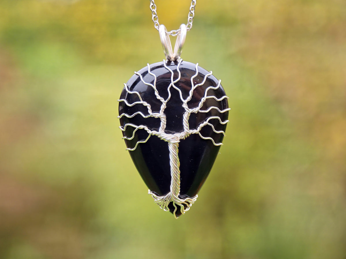 Tree pendant with a black onyx gemstone