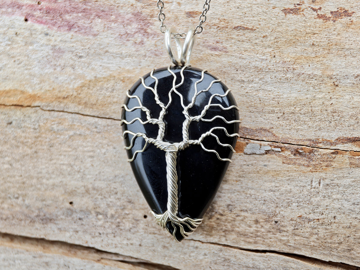 Tree pendant with a black onyx gemstone