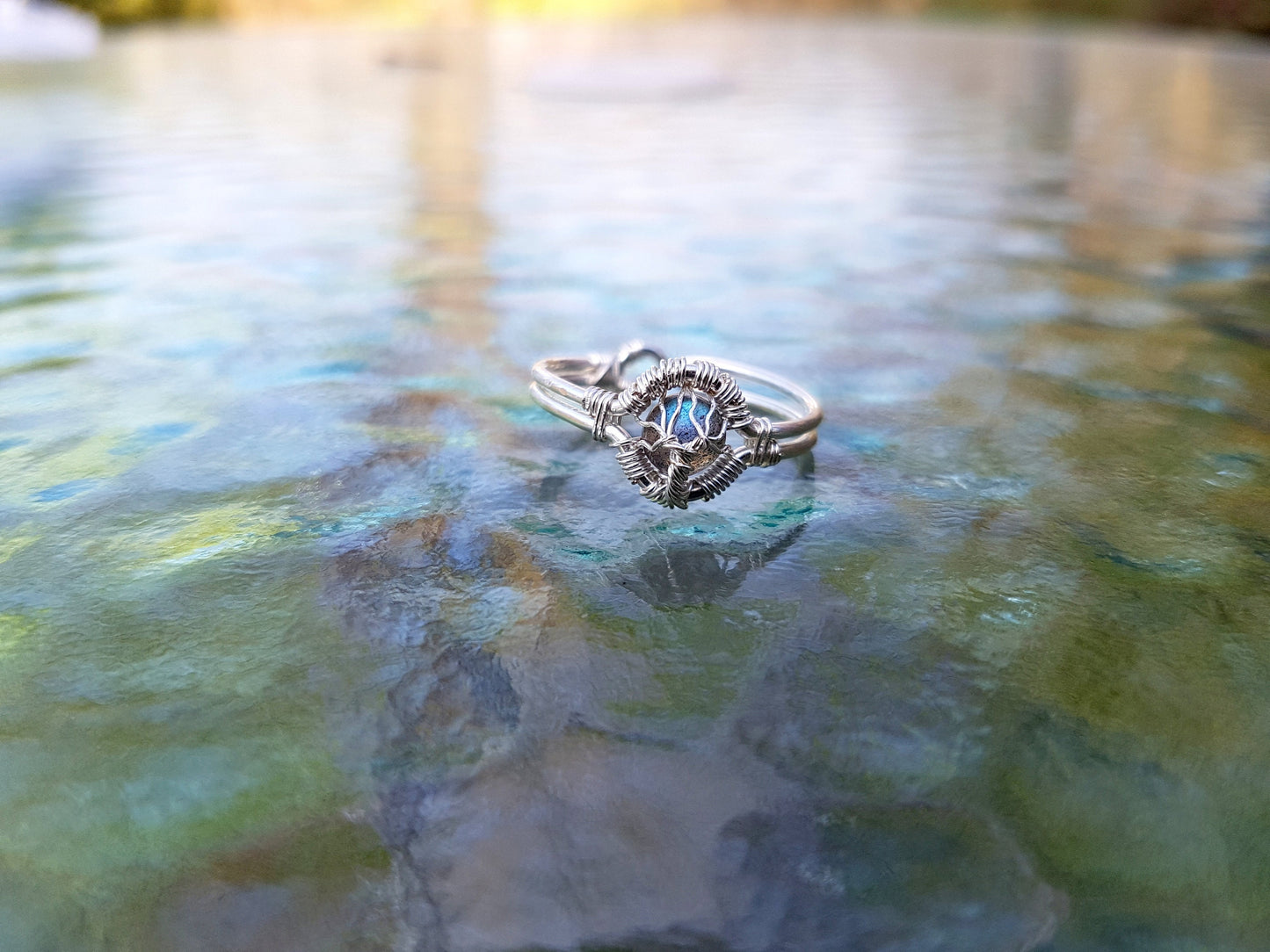 Tree ring with a labradorite gemstone