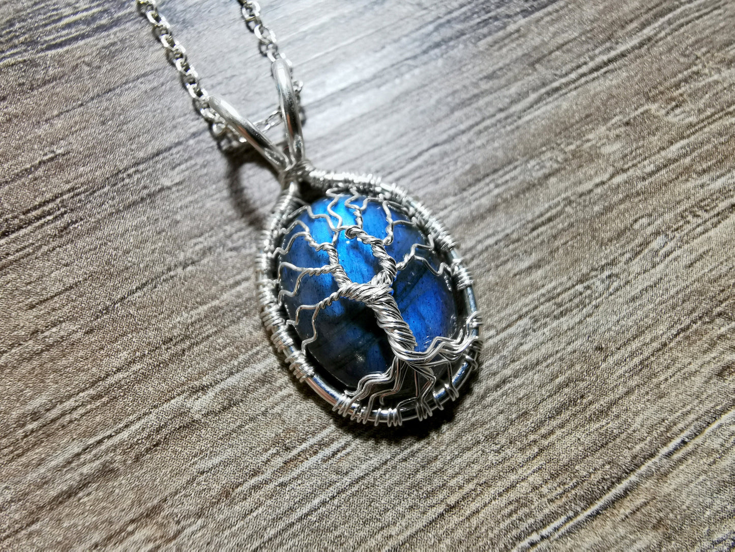 Tree pendant with a labradorite gemstones