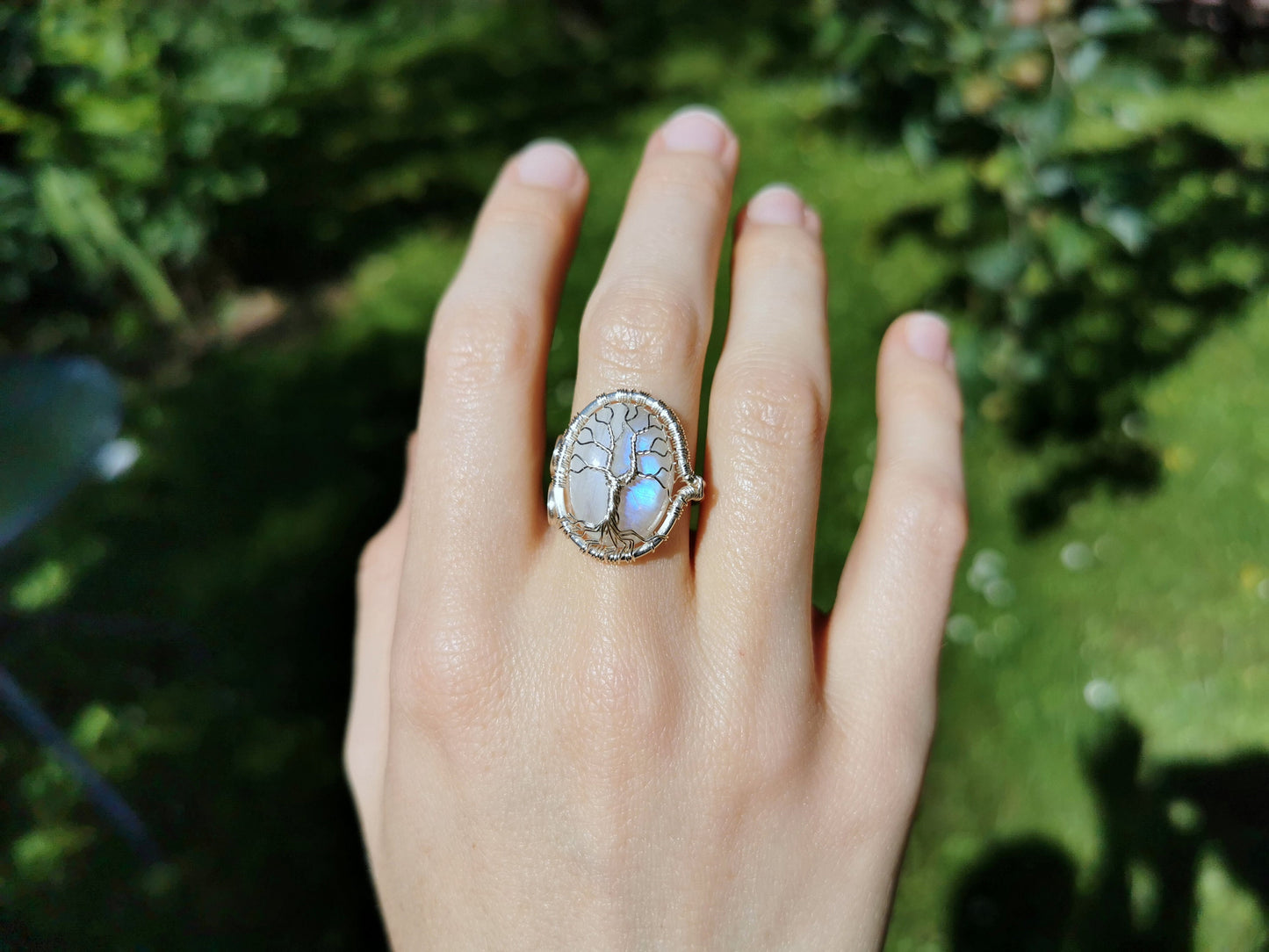 Tree ring with a moonstone