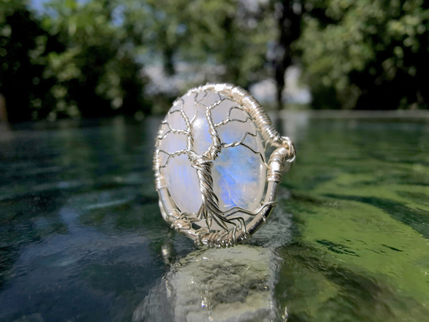 Tree ring with a moonstone