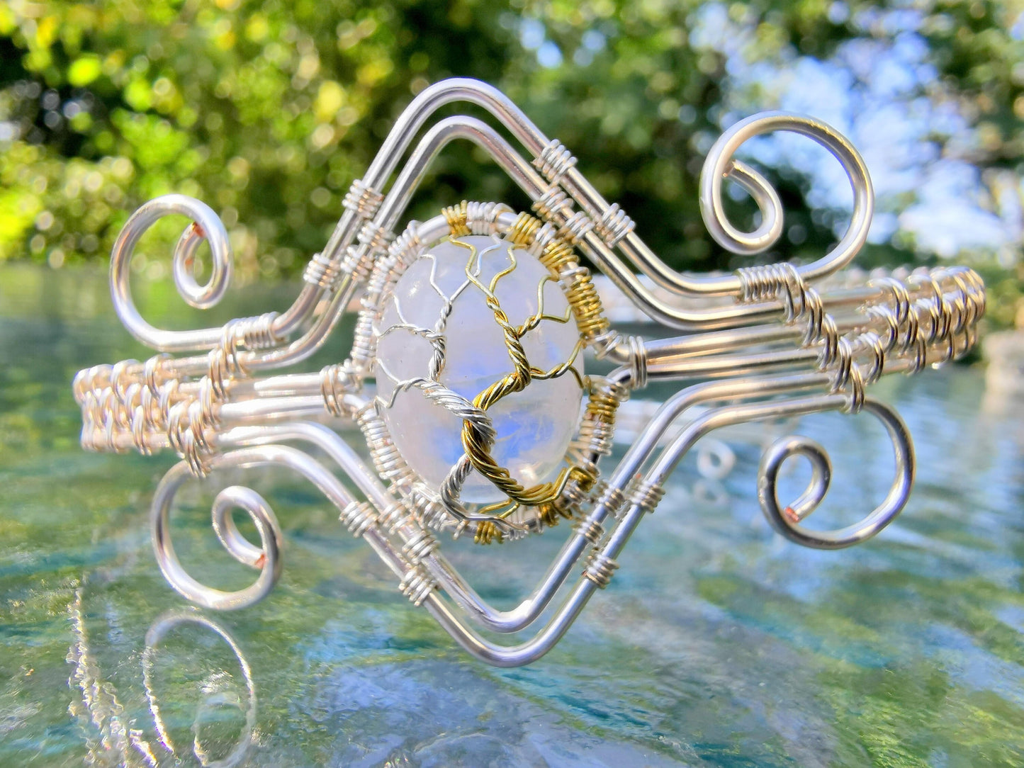 Fantasy inspired arm ring with a moonstone gemstone