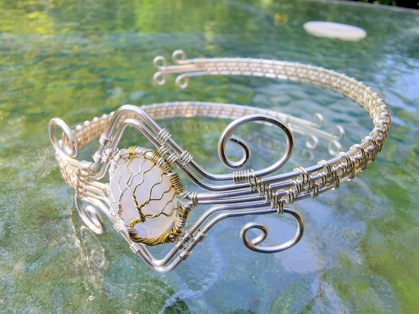 Fantasy inspired arm ring with a moonstone gemstone