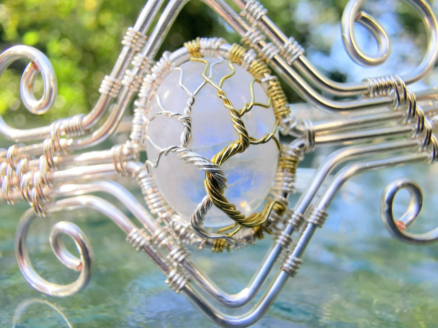 Fantasy inspired arm ring with a moonstone gemstone