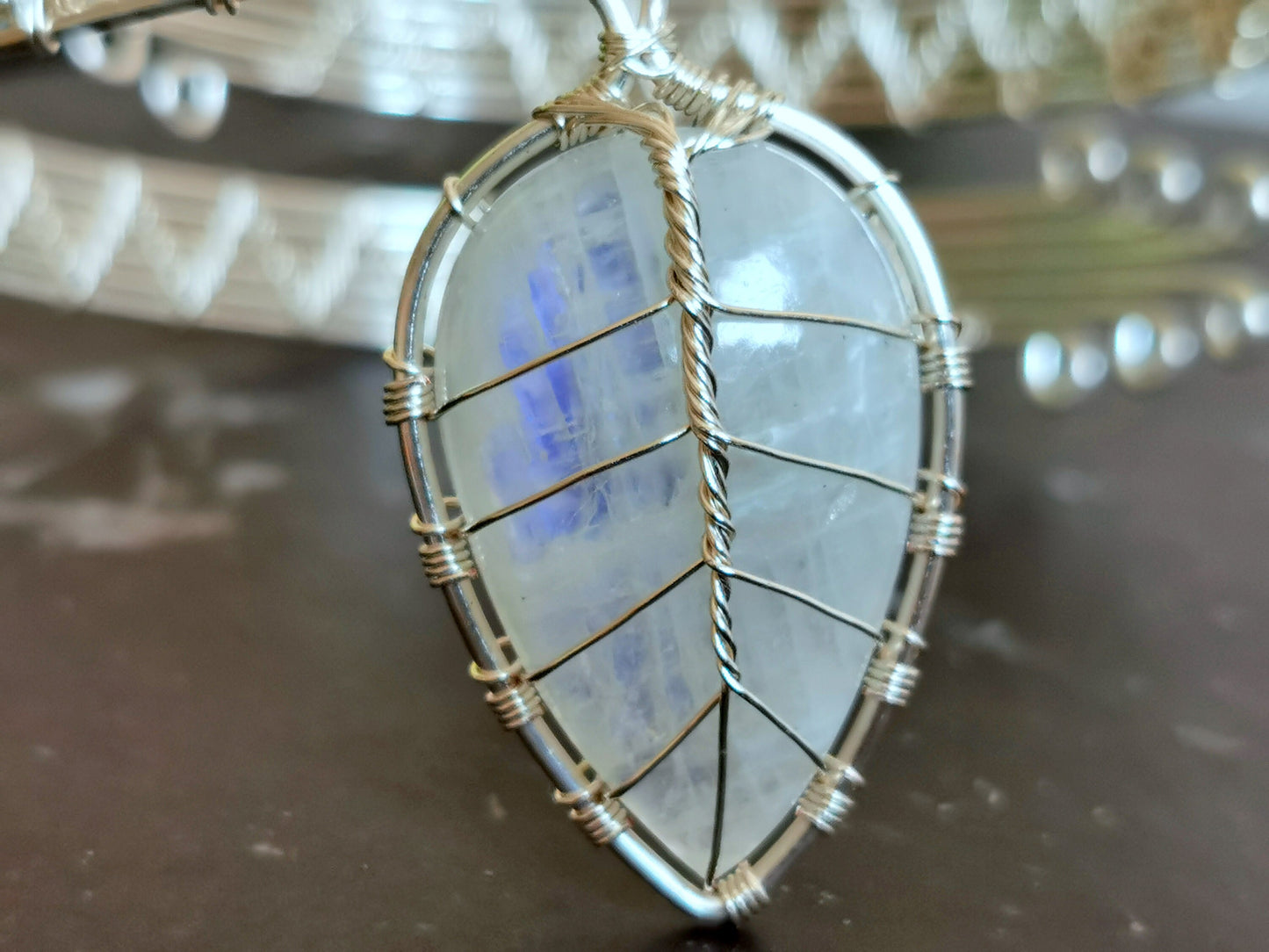 Leaf arm ring with a moonstone gemstone