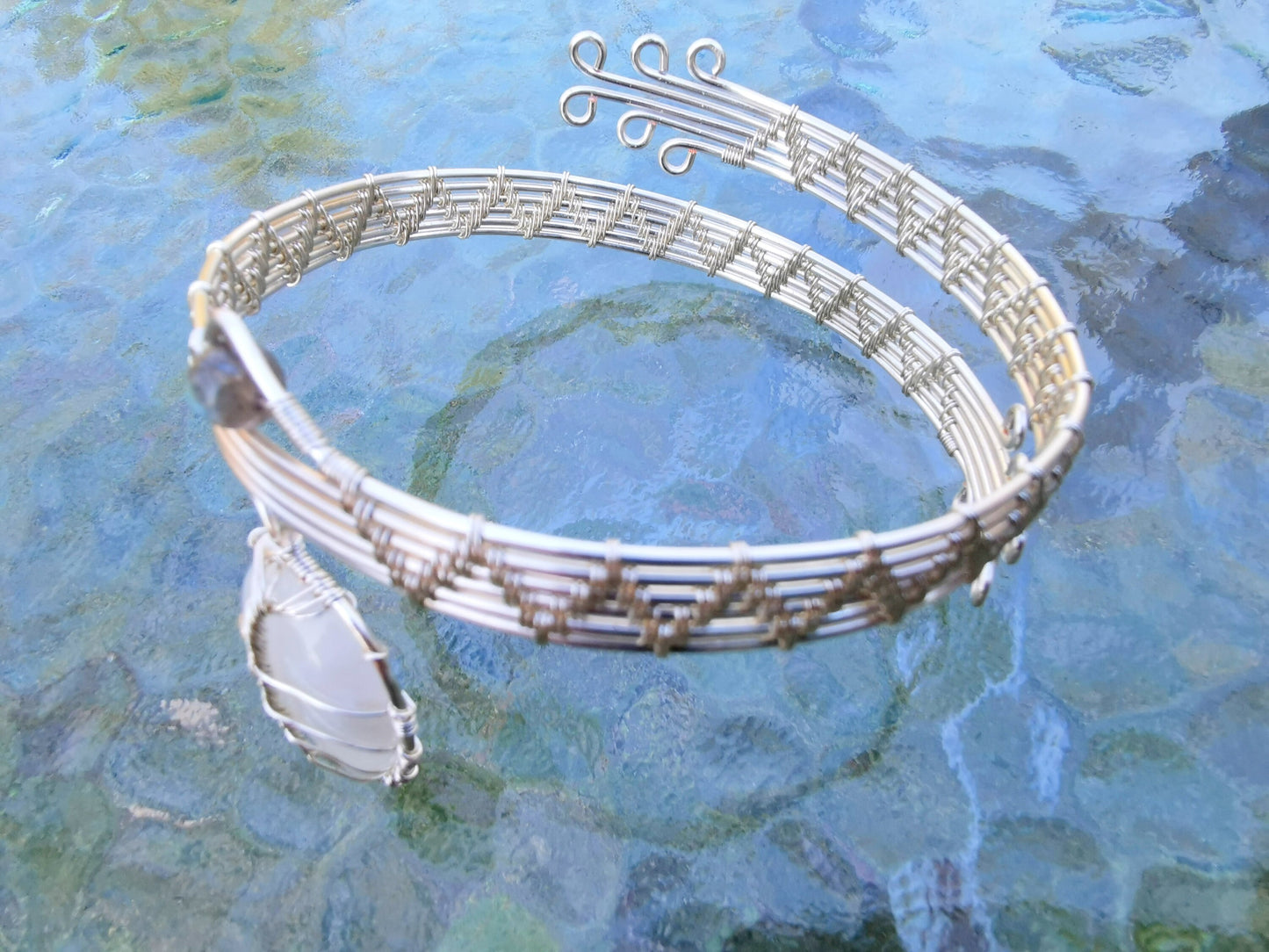 Leaf arm ring with a moonstone gemstone