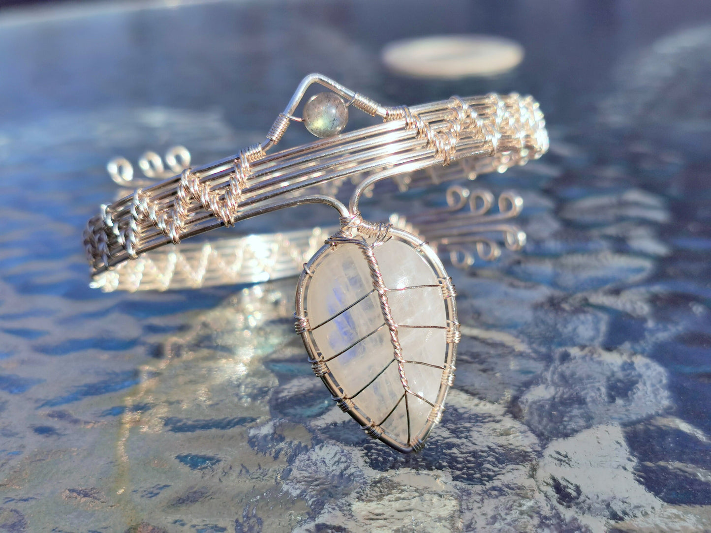 Leaf arm ring with a moonstone gemstone