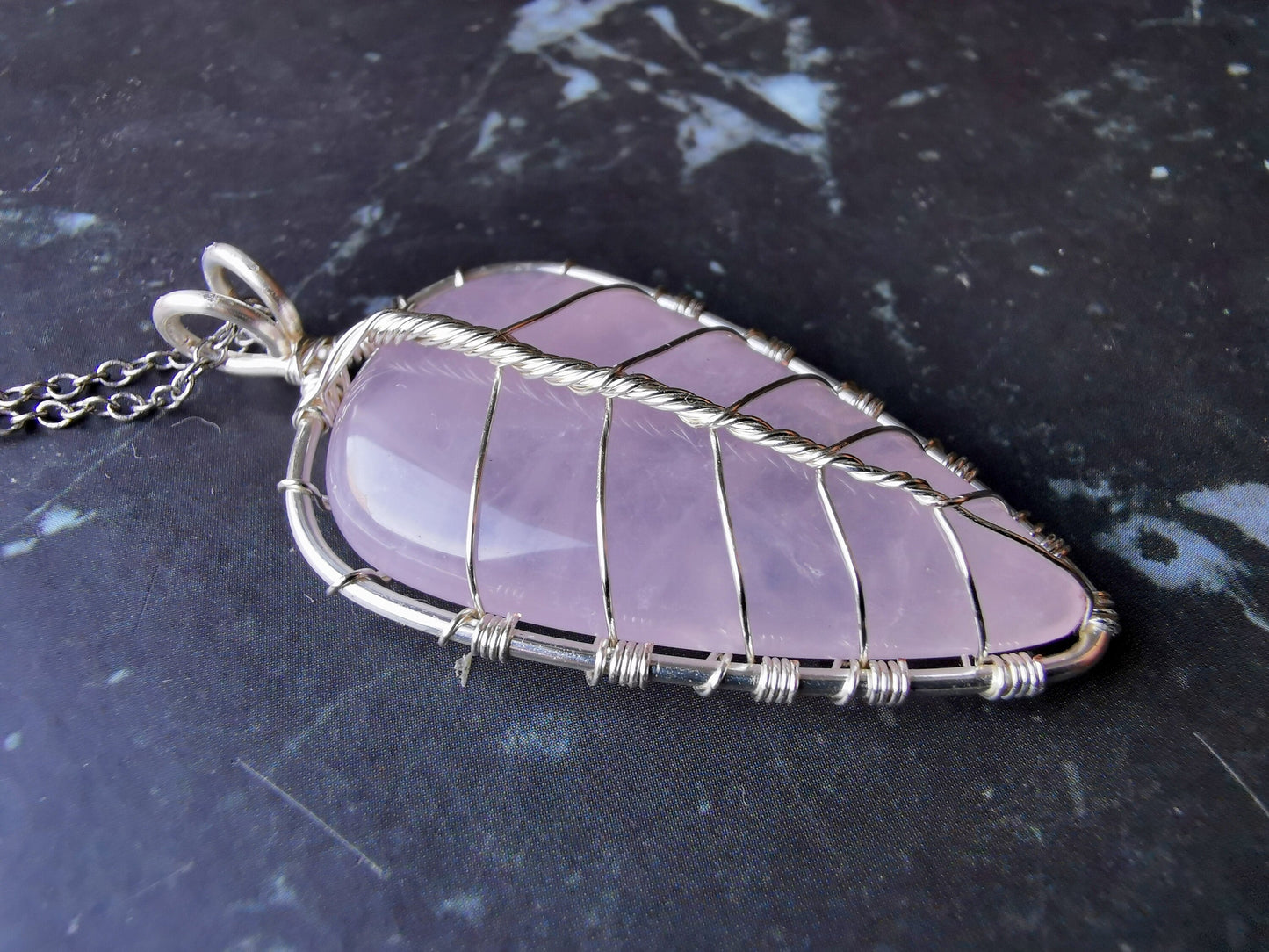 Leaf pendant with a rose quartz gemstone
