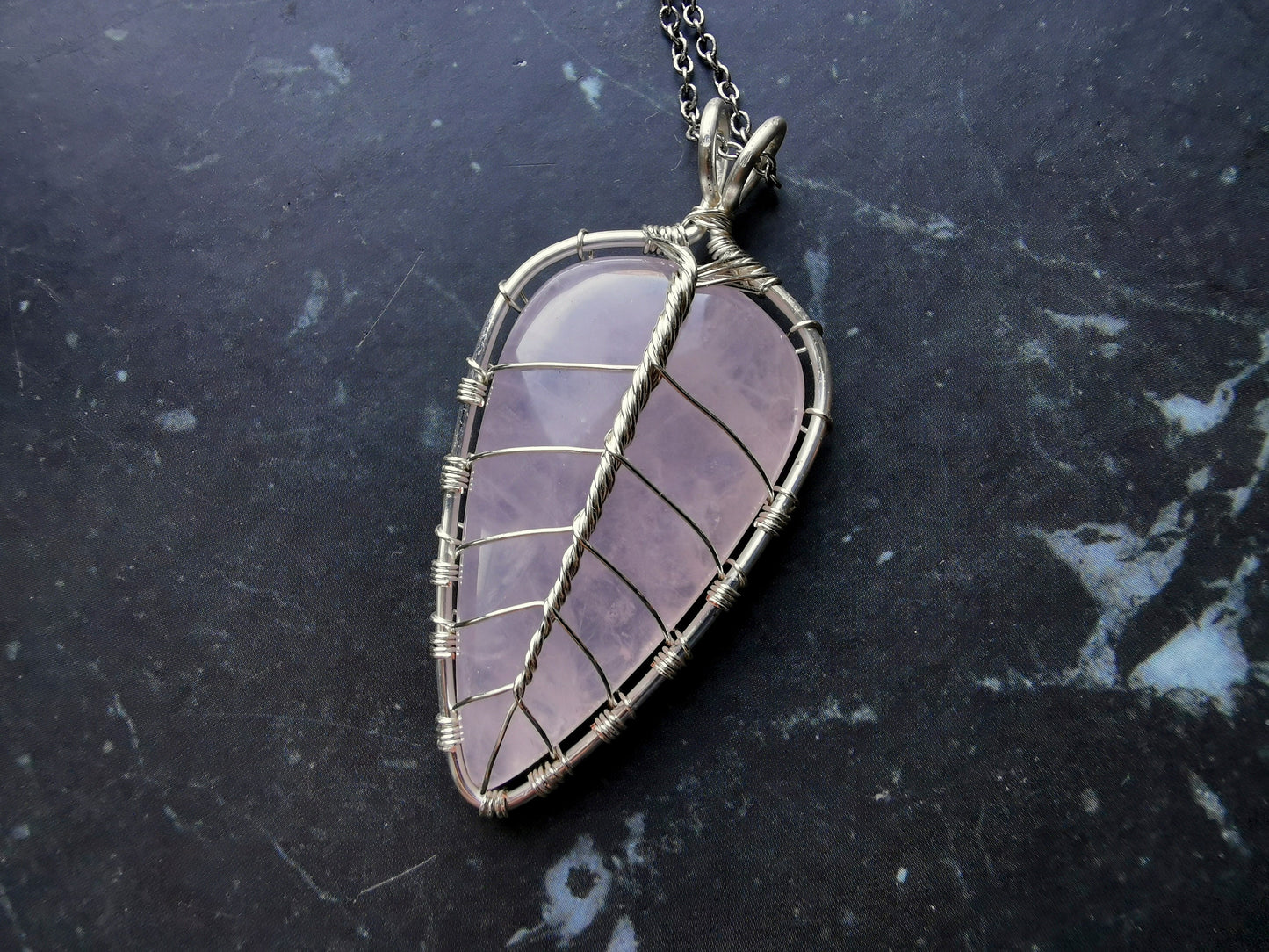 Leaf pendant with a rose quartz gemstone