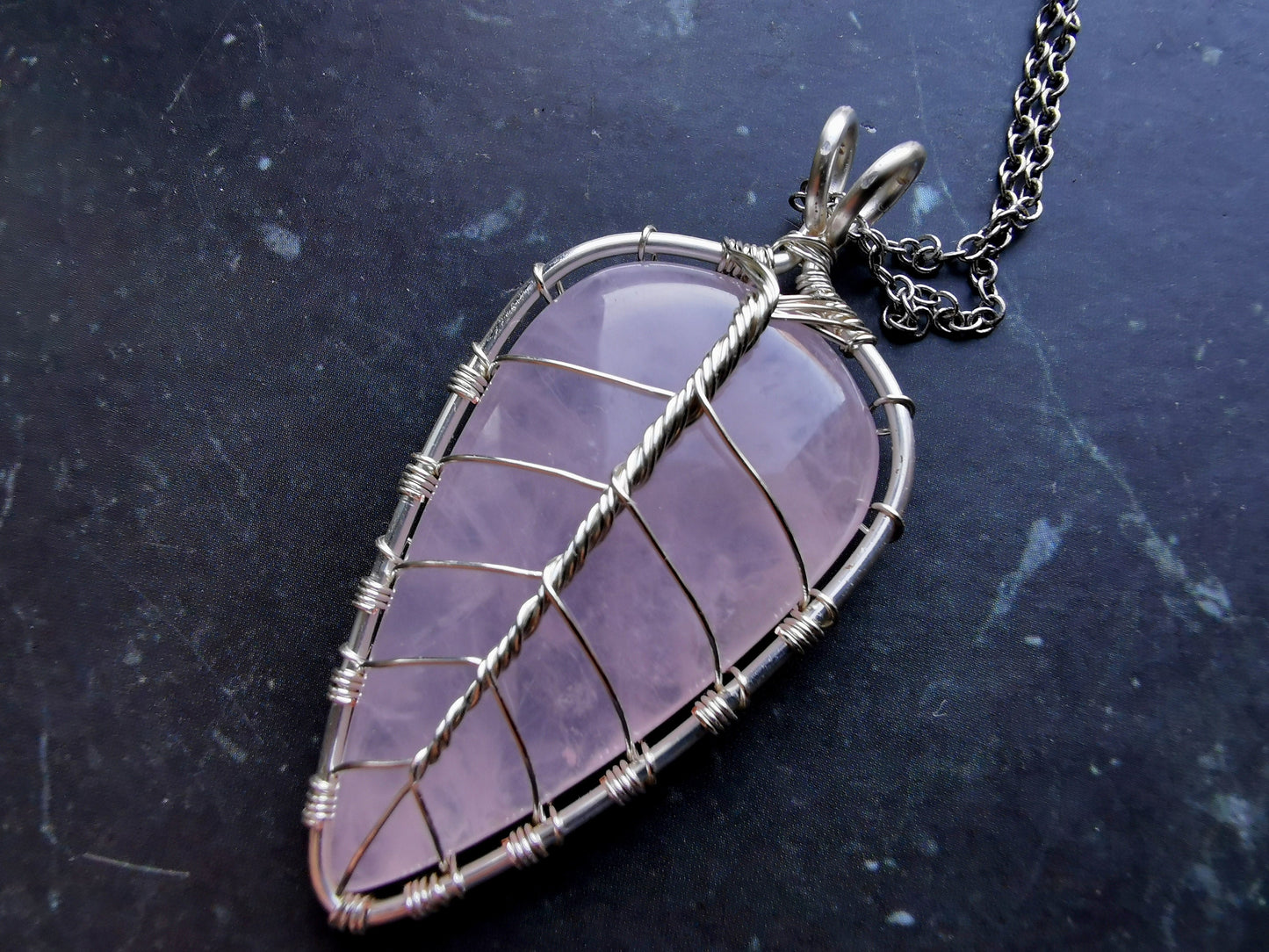 Leaf pendant with a rose quartz gemstone