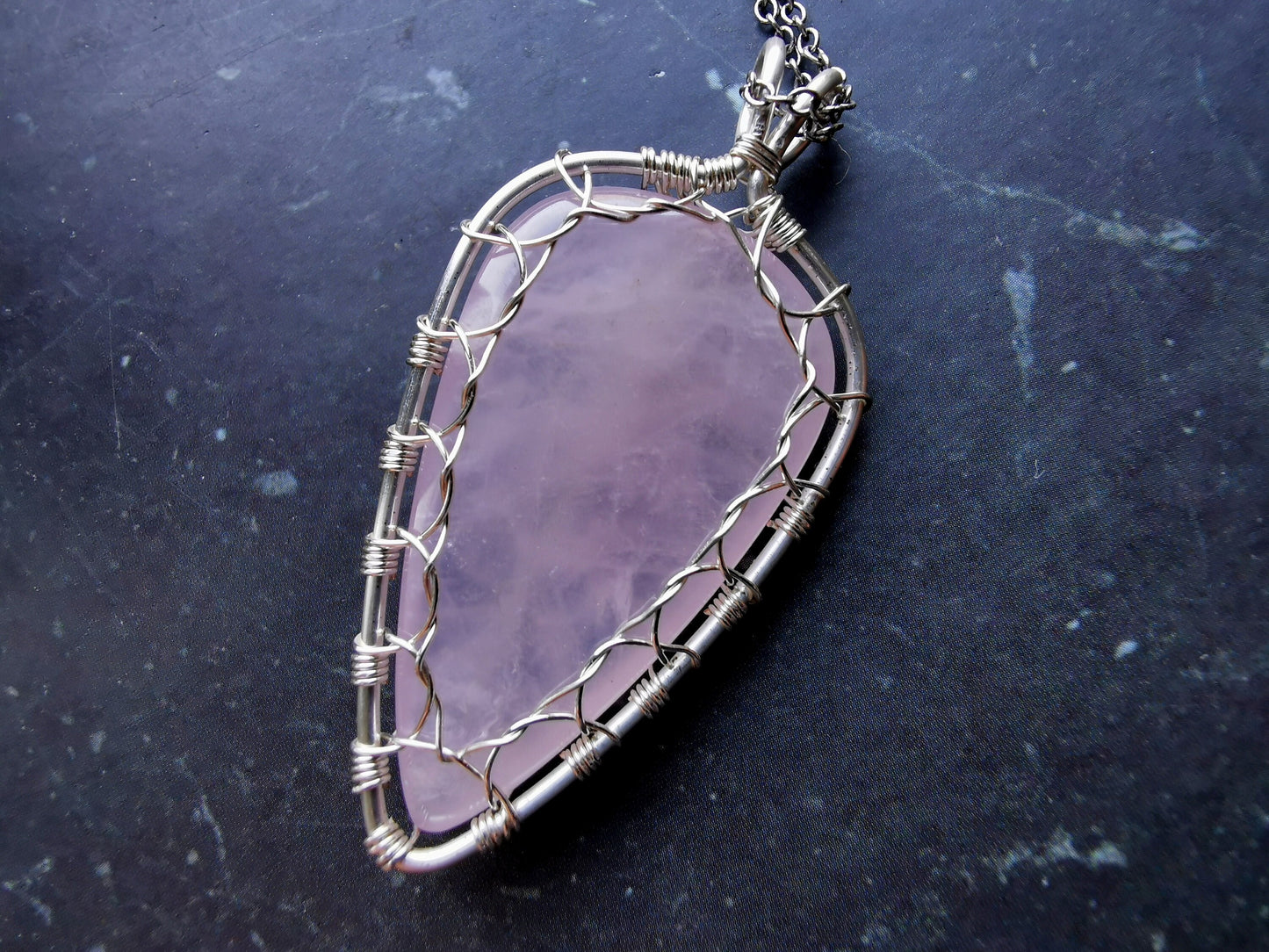 Leaf pendant with a rose quartz gemstone