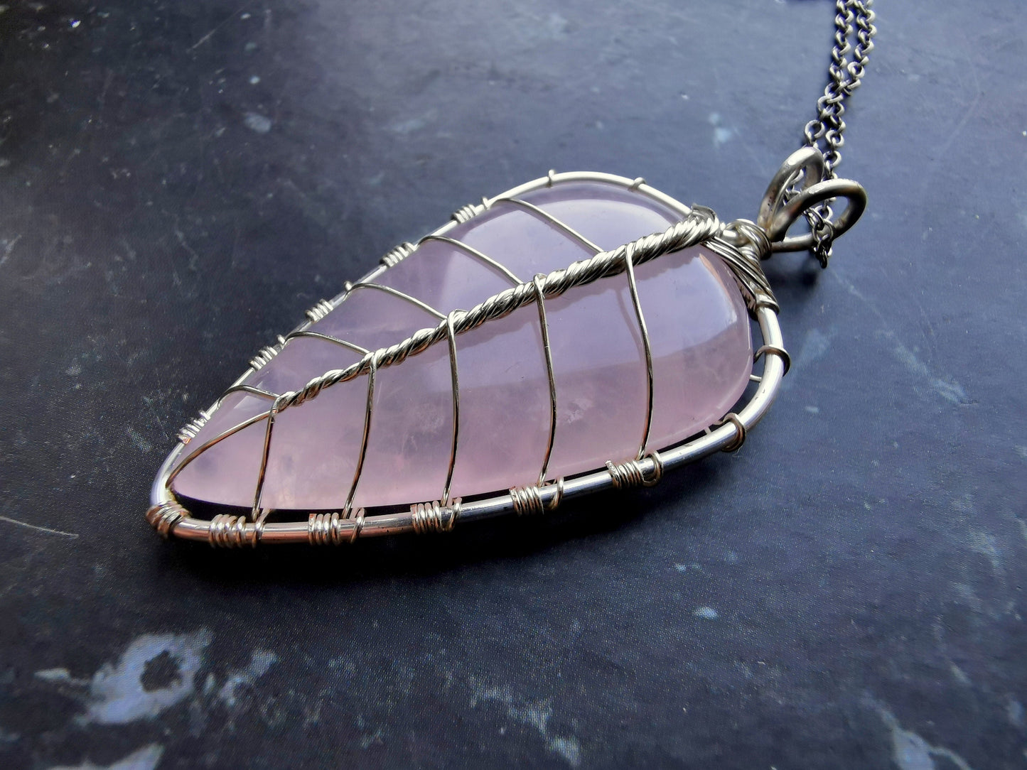 Leaf pendant with a rose quartz gemstone