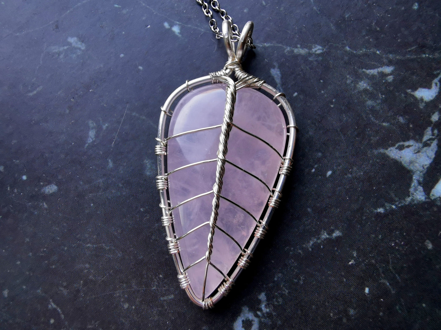 Leaf pendant with a rose quartz gemstone