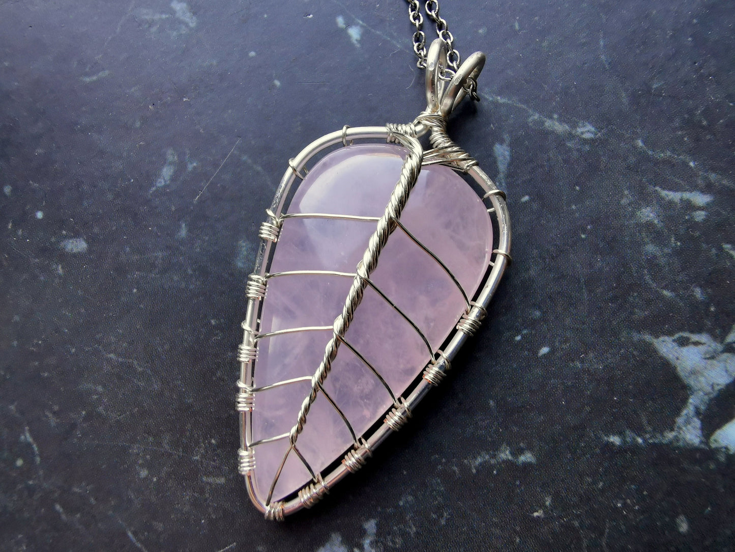 Leaf pendant with a rose quartz gemstone