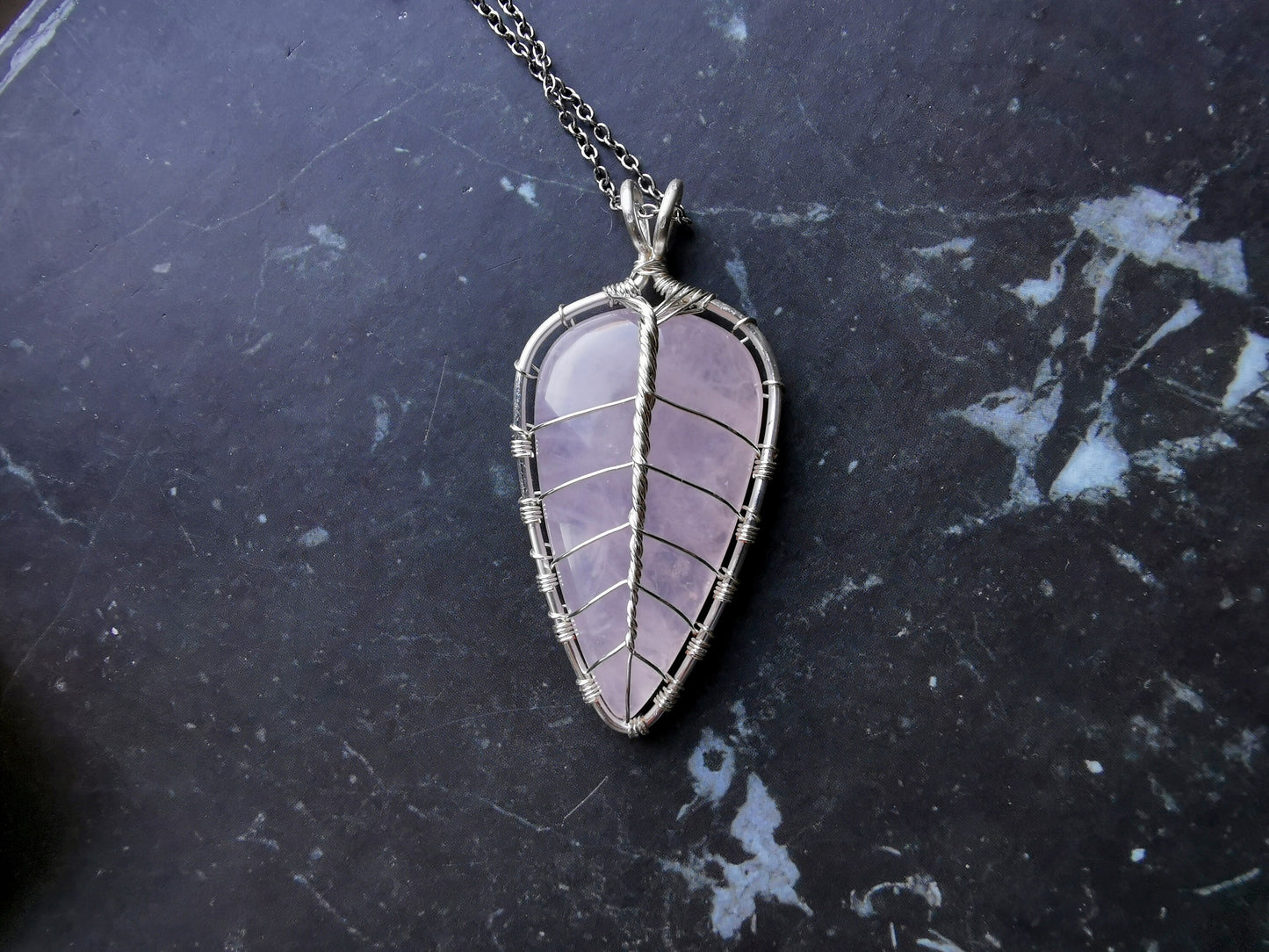 Leaf pendant with a rose quartz gemstone