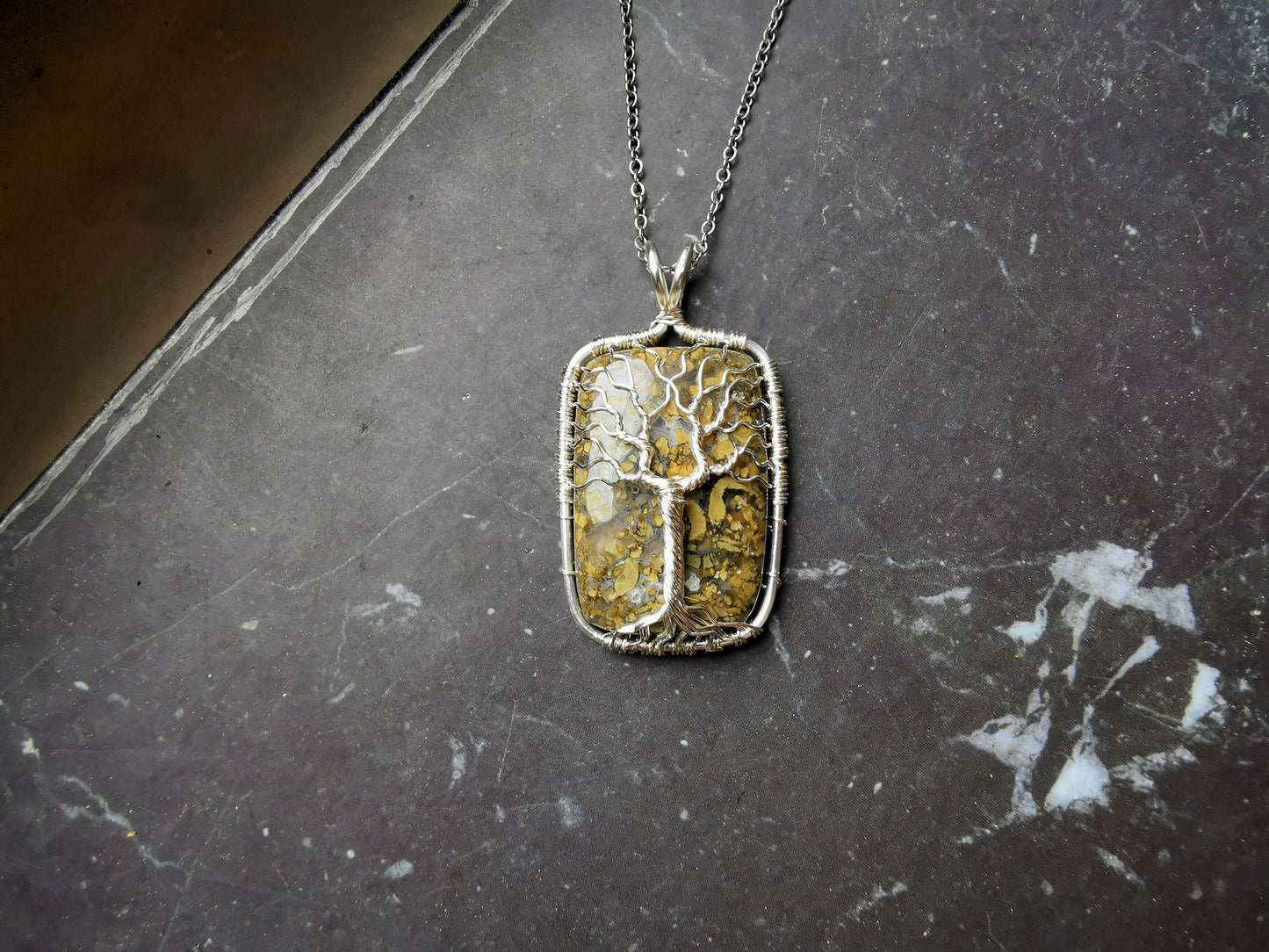 Tree pendant with a marcasite gemstone