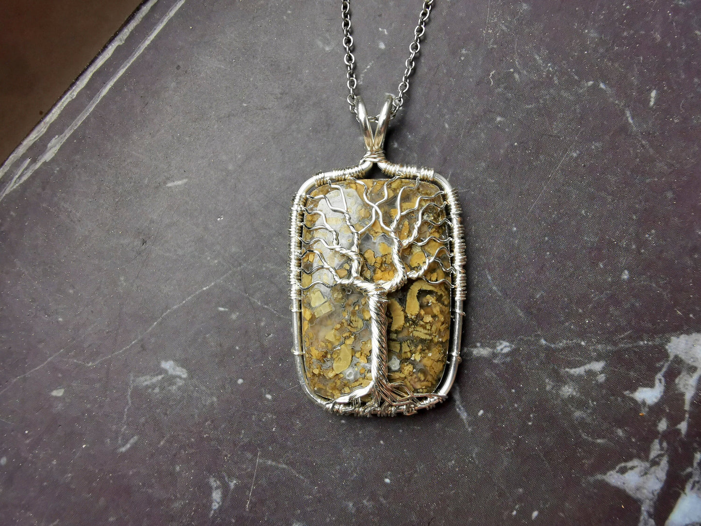 Tree pendant with a marcasite gemstone