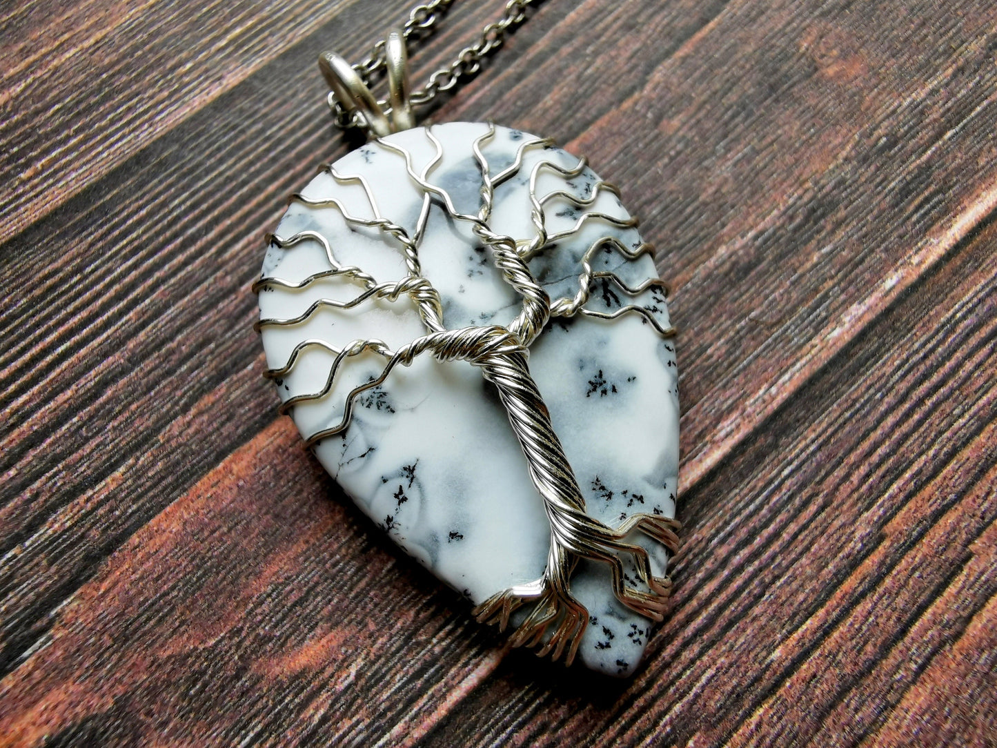 Tree pendant with a dendrite opal gemstone