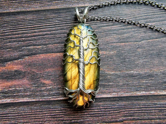 Tree pendant with a labradorite gemstone