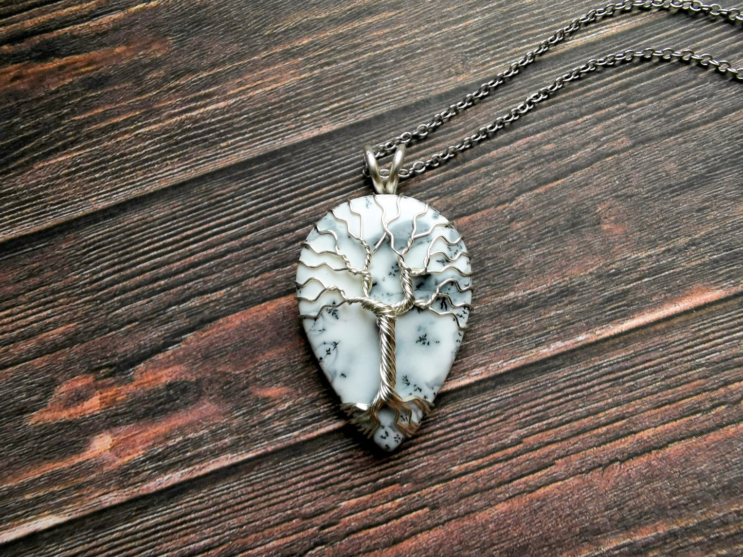 Tree pendant with a dendrite opal gemstone