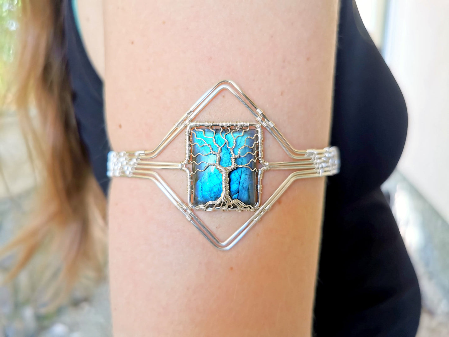 Tree arm ring with a labradorite gemstone