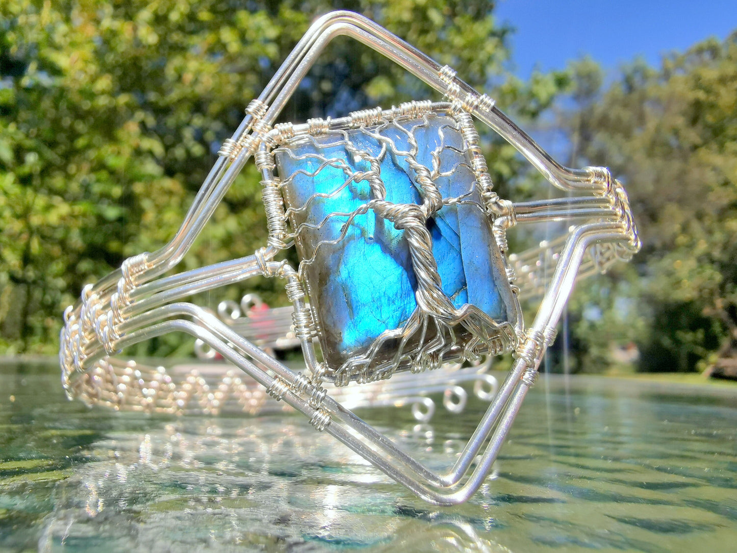 Tree arm ring with a labradorite gemstone