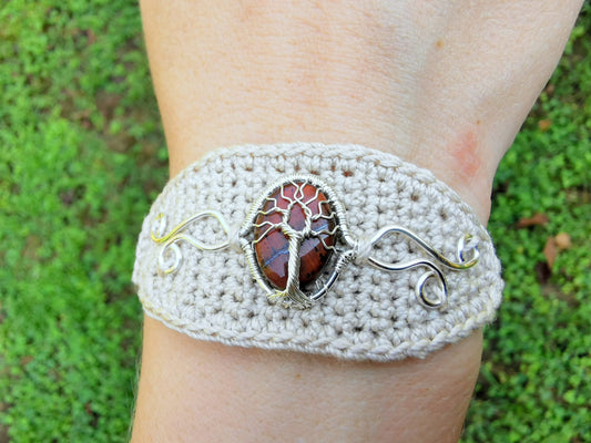 Crochet tree bracelet with a red tiger's eye gemstone