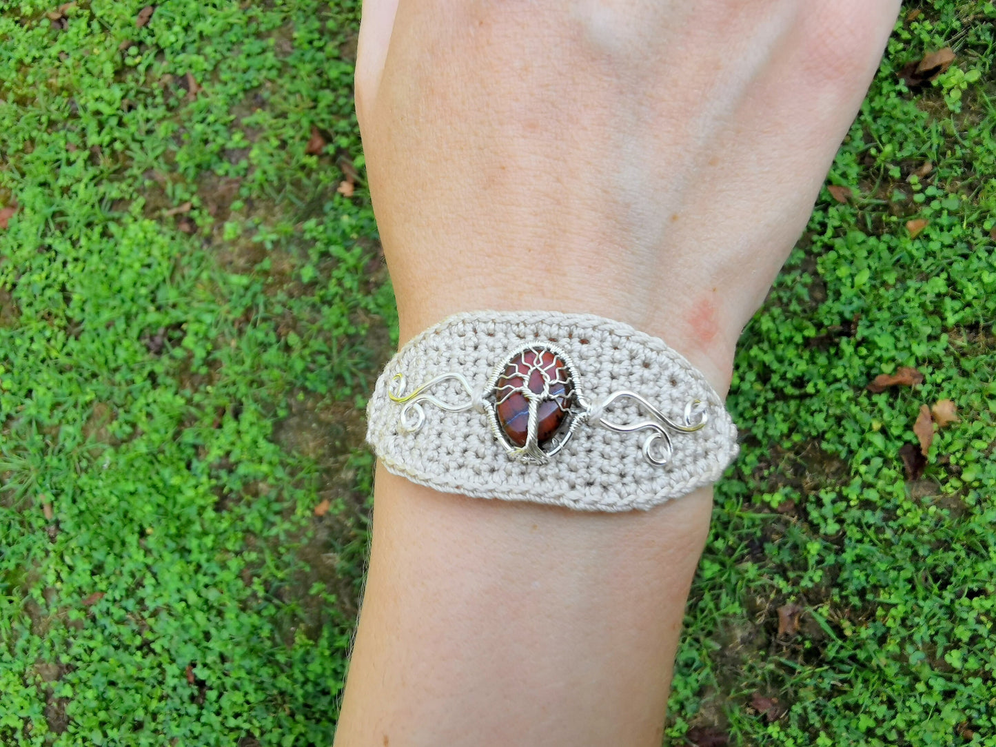 Crochet tree bracelet with a red tiger's eye gemstone