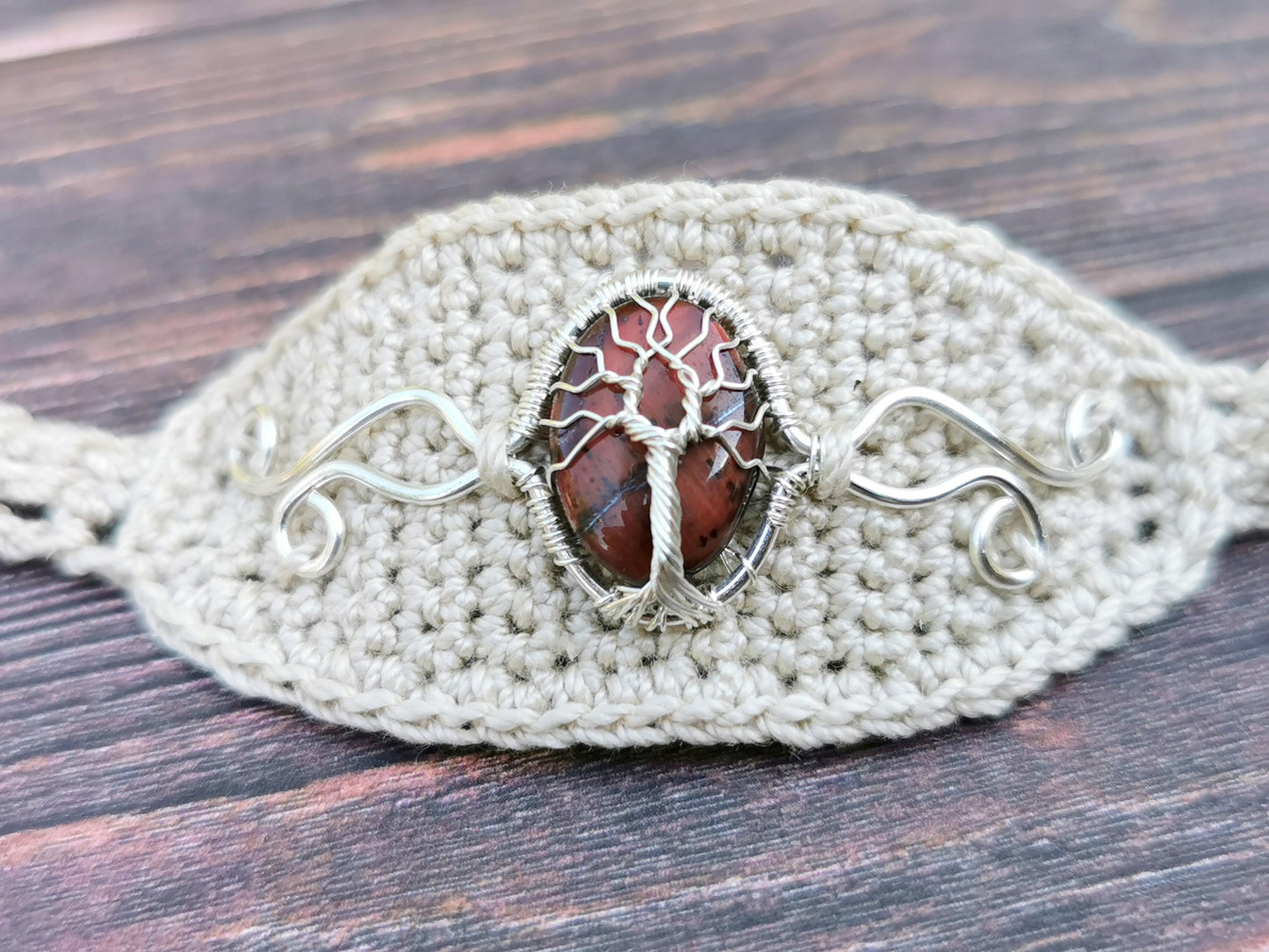Crochet tree bracelet with a red tiger's eye gemstone